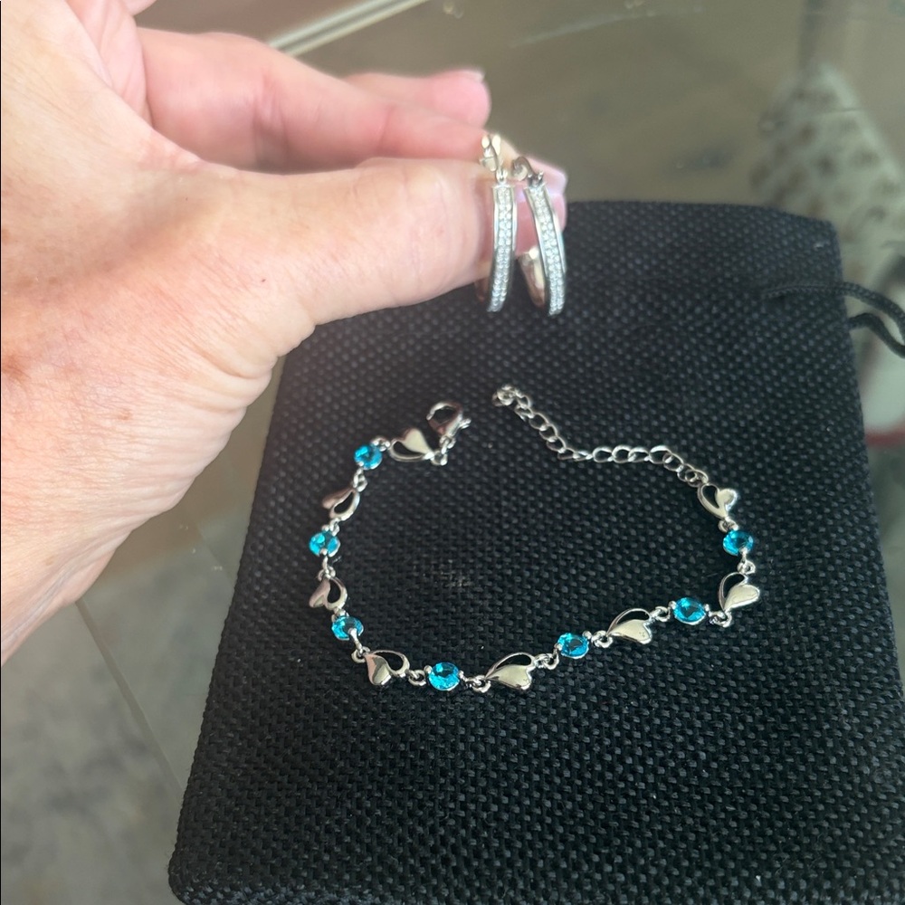 Silver Heart Link Bracelet with Blue Crystal Accents